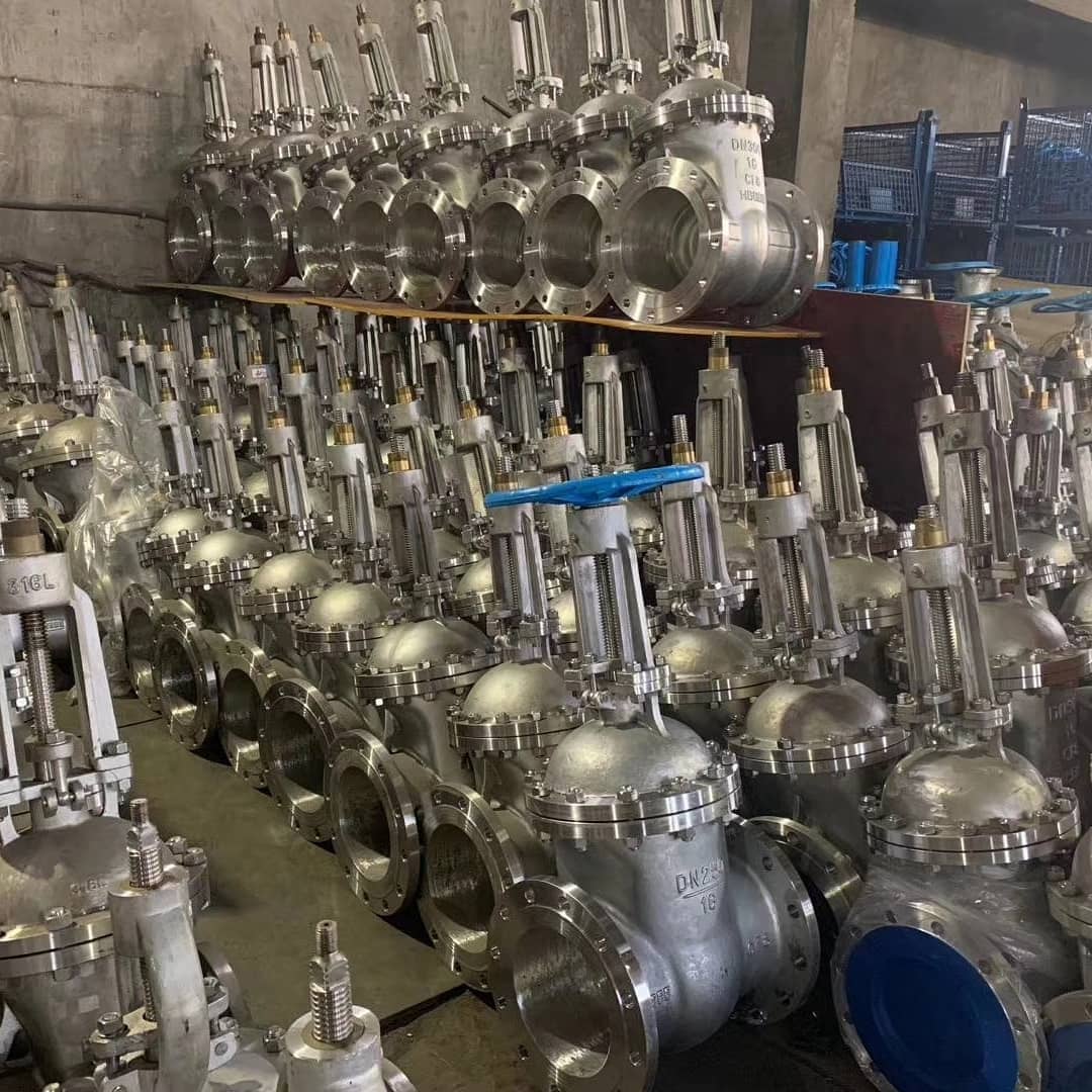 A large collection of Gate valves arranged in a warehouse, highlighting extensive stock availability.